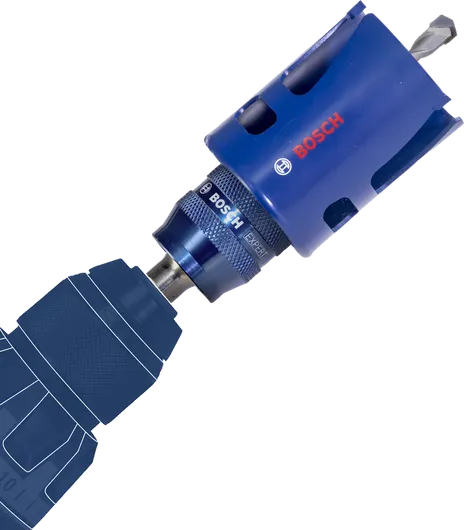 Máy khoan điện được trang bị mũi khoan lỗ xanh.