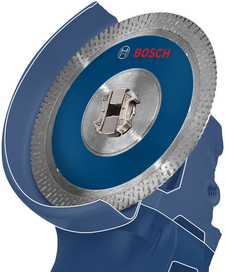 Cận cảnh máy mài góc màu xanh có gắn lưỡi cưa tròn.