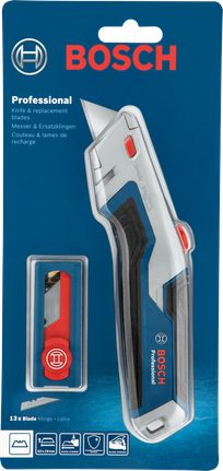 Dao rọc giấy và lưỡi dao dự phòng trong bao bì nhựa trên nền màu xanh dương.